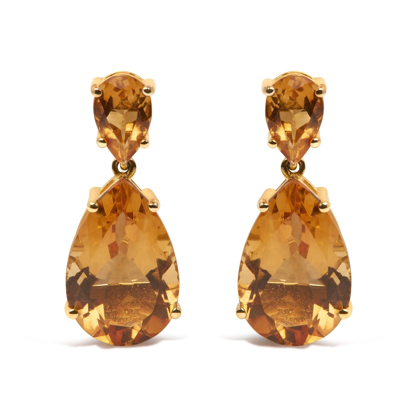 Front view of yellow metal earrings with pear-shaped orange gemstones in a two-tiered design.