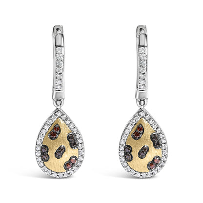 Close-up front view of a pair of yellow metal drop earrings with teardrop-shaped pendants. The pendants feature scattered orange and blue round gemstones in prong settings on a textured yellow background, surrounded by a border of white round gemstones in shared prong settings. The top part of the earrings also has a row of white round gemstones in prong settings. The earrings are shown on a white background.