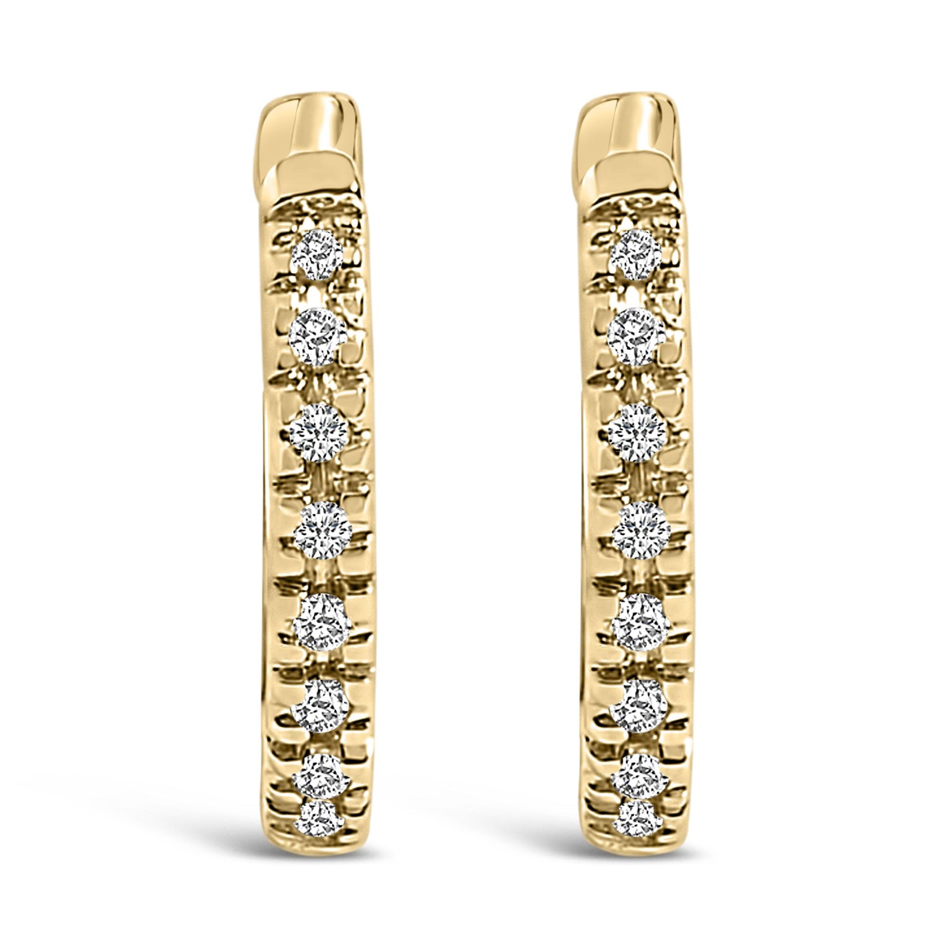 Front-facing close-up of a pair of yellow metal hoop earrings set with round white gemstones in a vertical line.