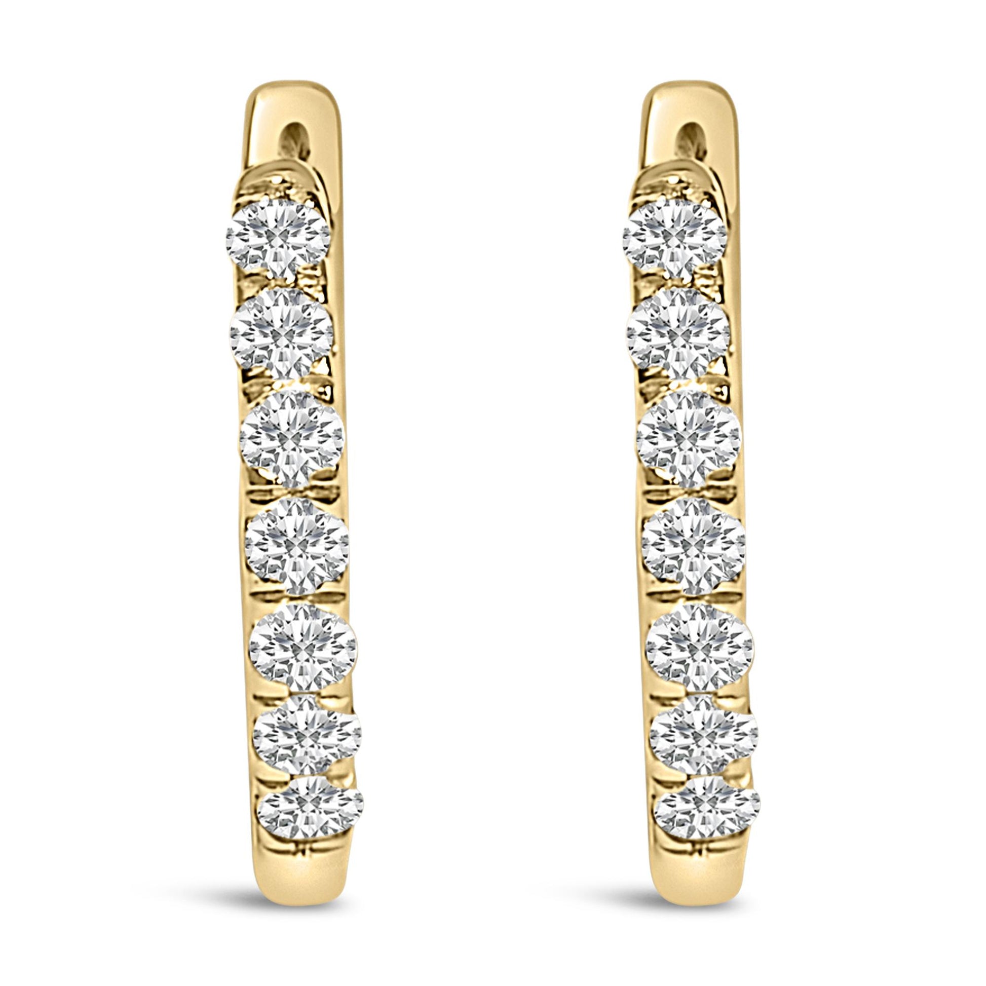 Pair of yellow metal hoop earrings with a row of round white gemstones in shared prong setting, shown from a front angle on a white background.