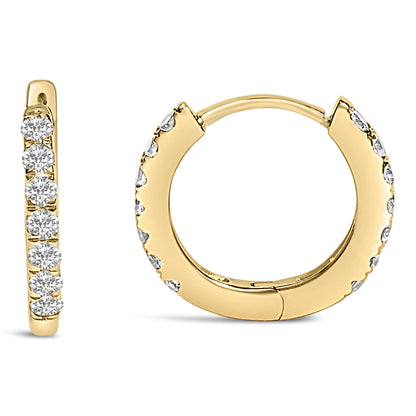 Close-up front and side views of a pair of yellow hoop earrings set with round white gemstones in a shared prong setting.