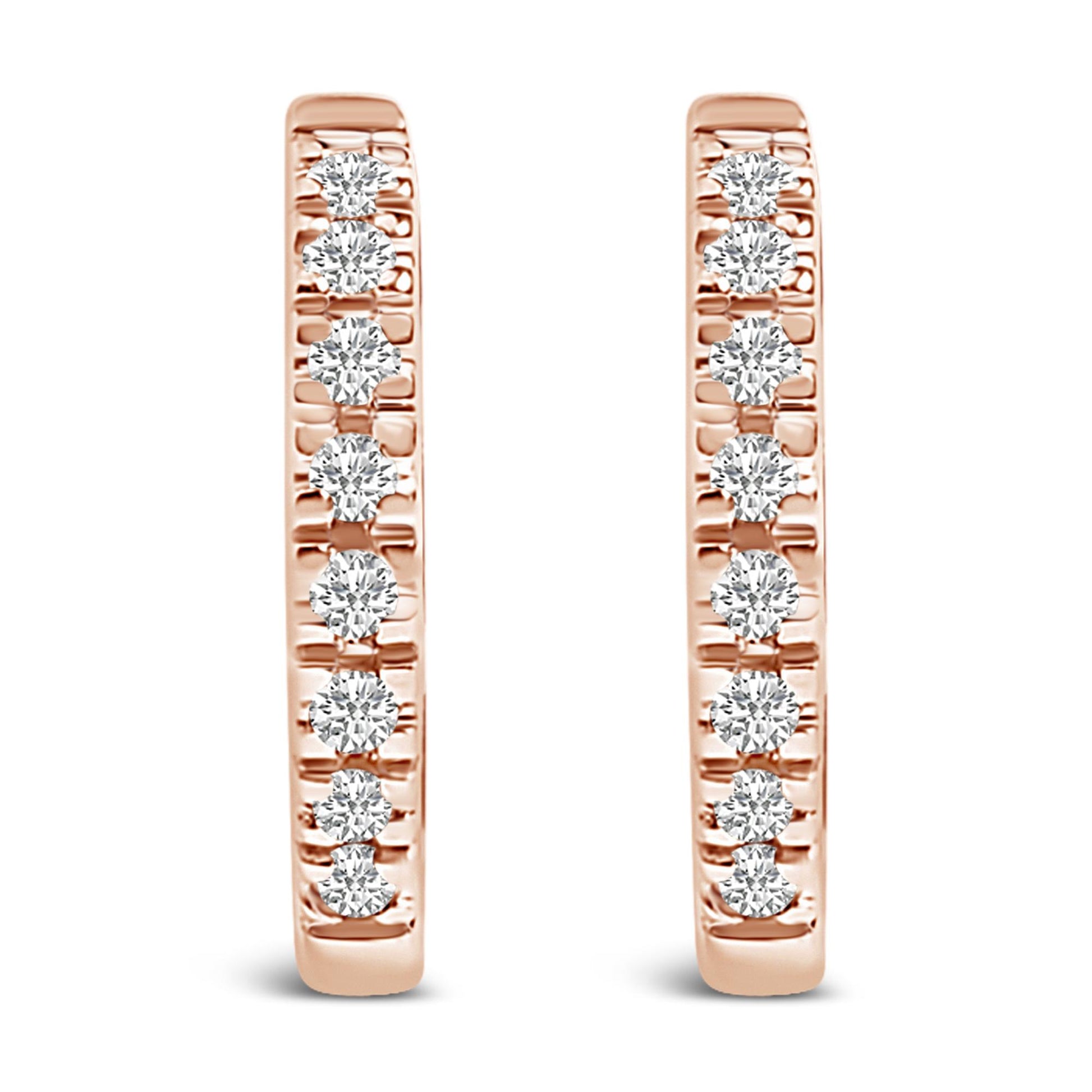 Front view of a pair of rose-colored metal hoop earrings each set with multiple round white gemstones in a 4-prong setting.
