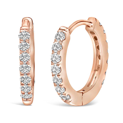 Close-up front and side views of rose-colored hoop earrings with round white gemstones set in a shared prong setting, shown on a white background.
