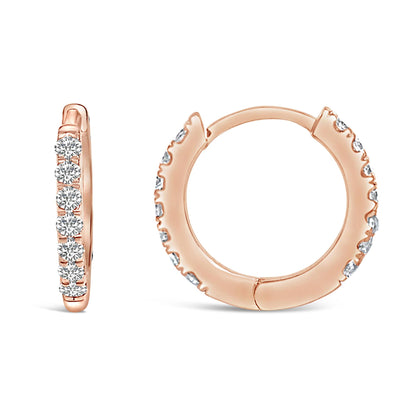 Rose metal hoop earrings with round white gemstones in shared prong setting, shown front and side angles.