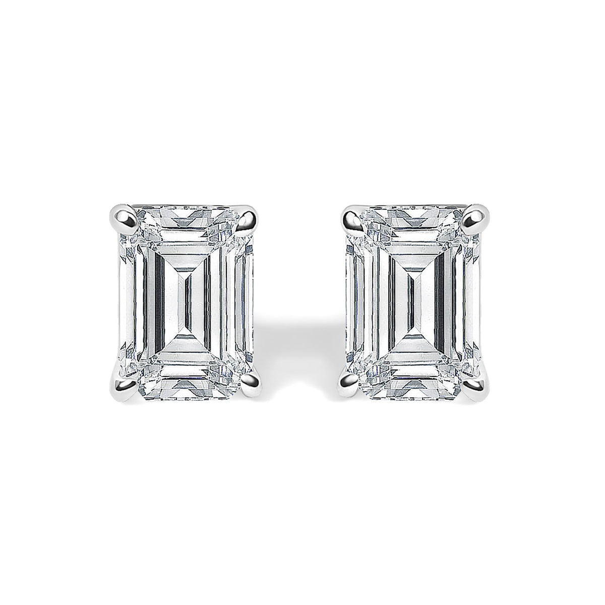 Close-up front view of a pair of white metal stud earrings featuring emerald-shaped white gemstones in 4-prong settings.