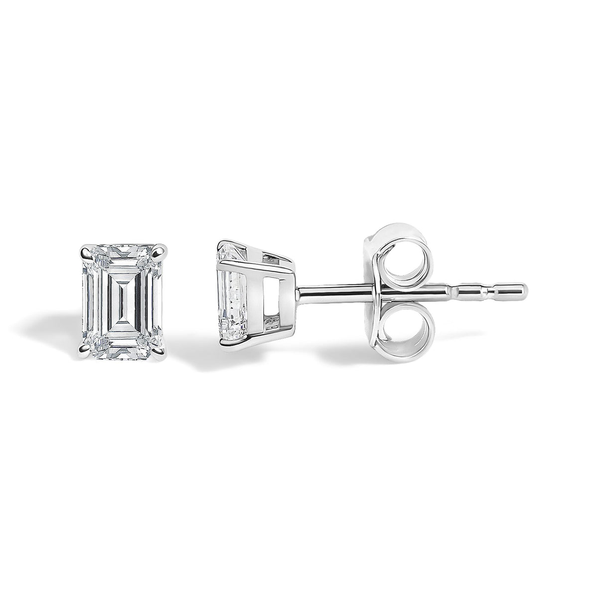 Close-up side and front view of a white metal earring with an emerald-shaped white gemstone in a four-prong setting shown on a white background.