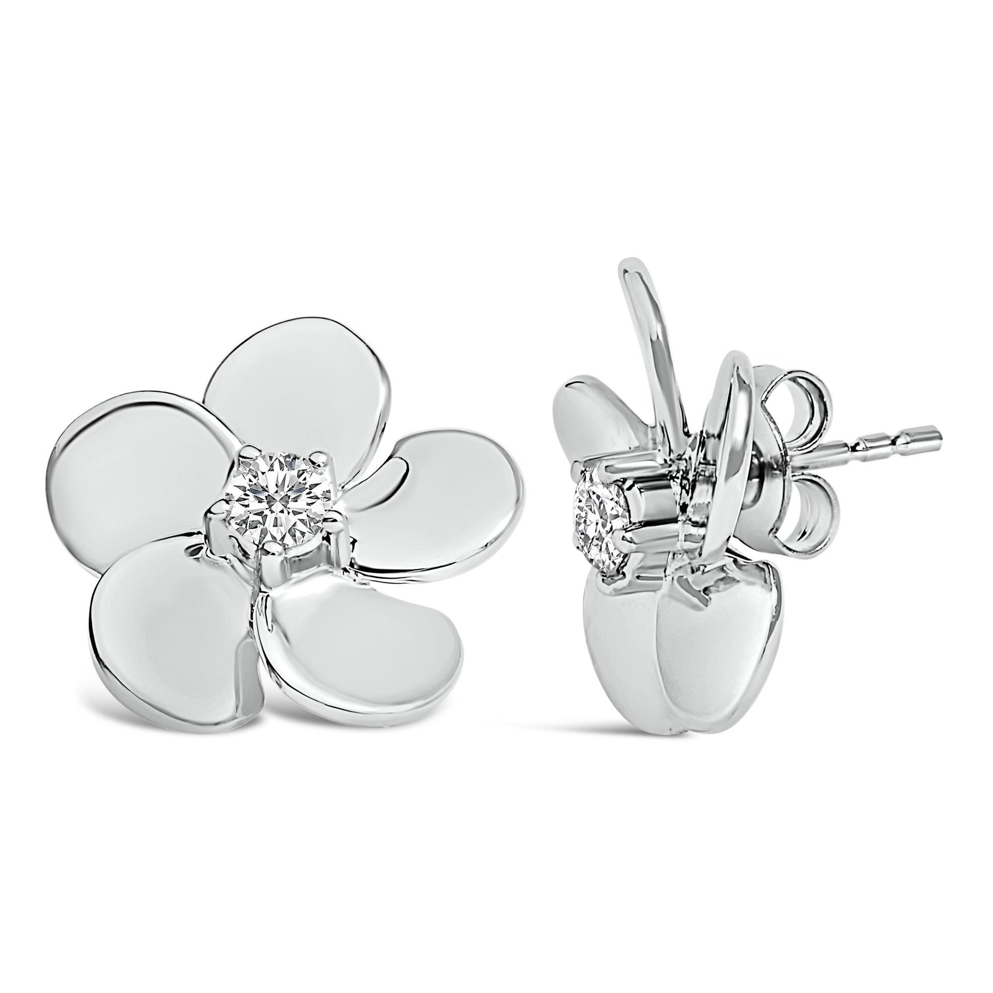 White metal flower-shaped stud earrings with a round white gemstone at the center, shown from front and side angles.
