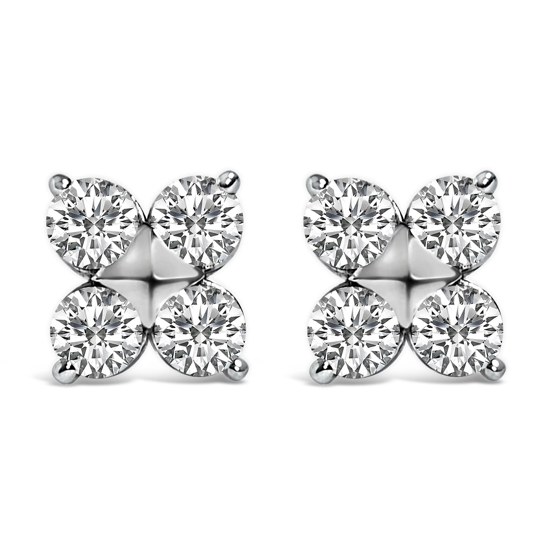Pair of white metal stud earrings with four round white gemstones in prong settings arranged in a square pattern, shown from the front on a white background.