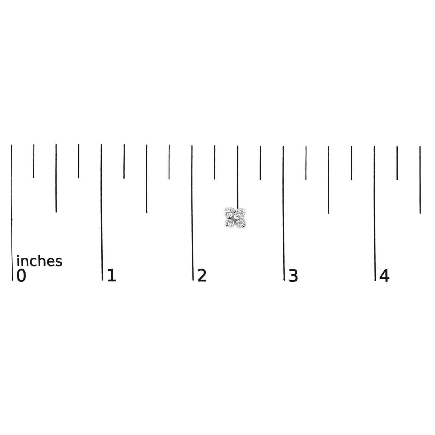 Close-up of a white metal earring with four round white gemstones in prong settings, shown on a ruler scale with measurements in inches.