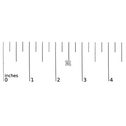 Close-up of a white metal earring with four round white gemstones in prong settings, shown on a ruler scale with measurements in inches.