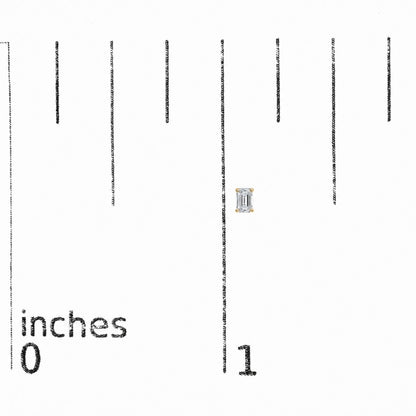 Close-up front view of a single yellow metal stud earring featuring a rectangular emerald-shaped white gemstone in a four-prong setting, shown on a ruler for scale.