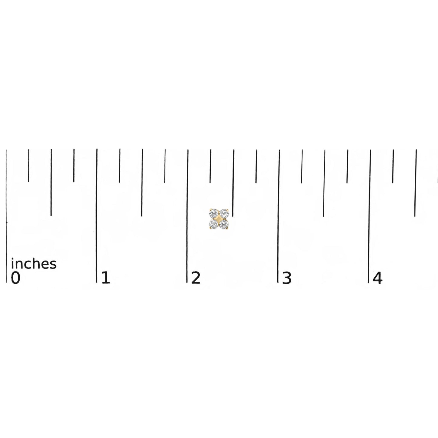 Close-up top view of yellow metal earrings with four white round gemstones set in prongs, shown on a scale.