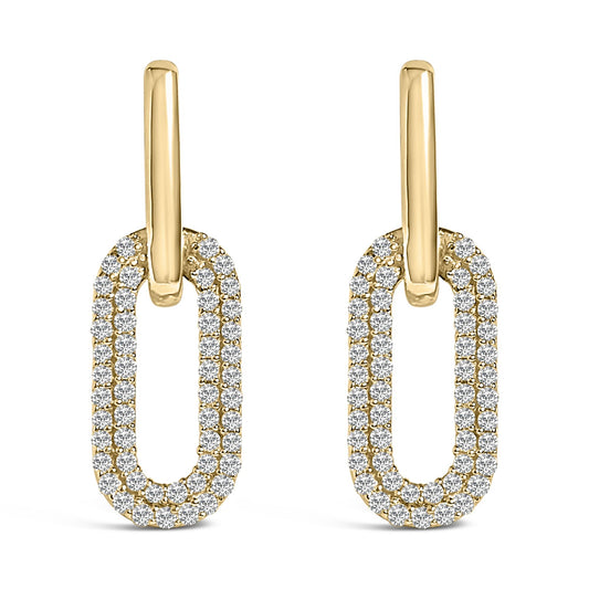 Front angle view of a pair of yellow metal earrings featuring elongated oval shapes encrusted with round white gemstones in a shared prong setting.