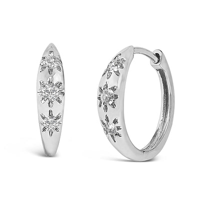 Close-up front and side views of a pair of white metal hoop earrings adorned with multiple prong-set round white gemstones.