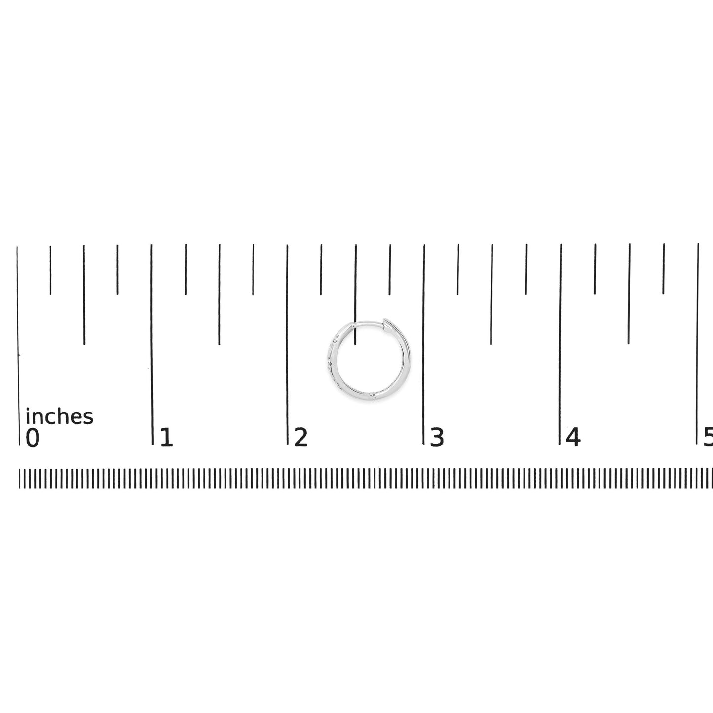 White metal hoop earring with round white gemstones in prong setting, shown on a ruler scale from a top-down angle.