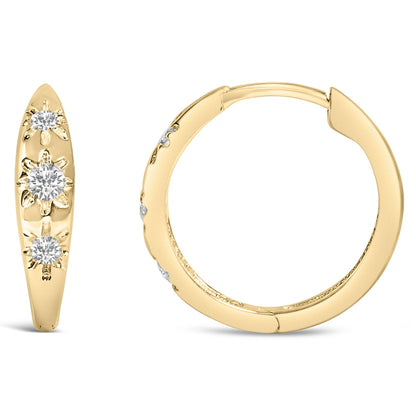 Close-up front and side view of a pair of yellow hoop earrings adorned with round white gemstones in prong settings.