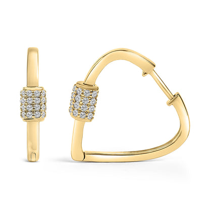 Close-up front and side views of yellow metal triangular-shaped hoop earrings with a cluster of round white gemstones set in shared prongs on the front section.