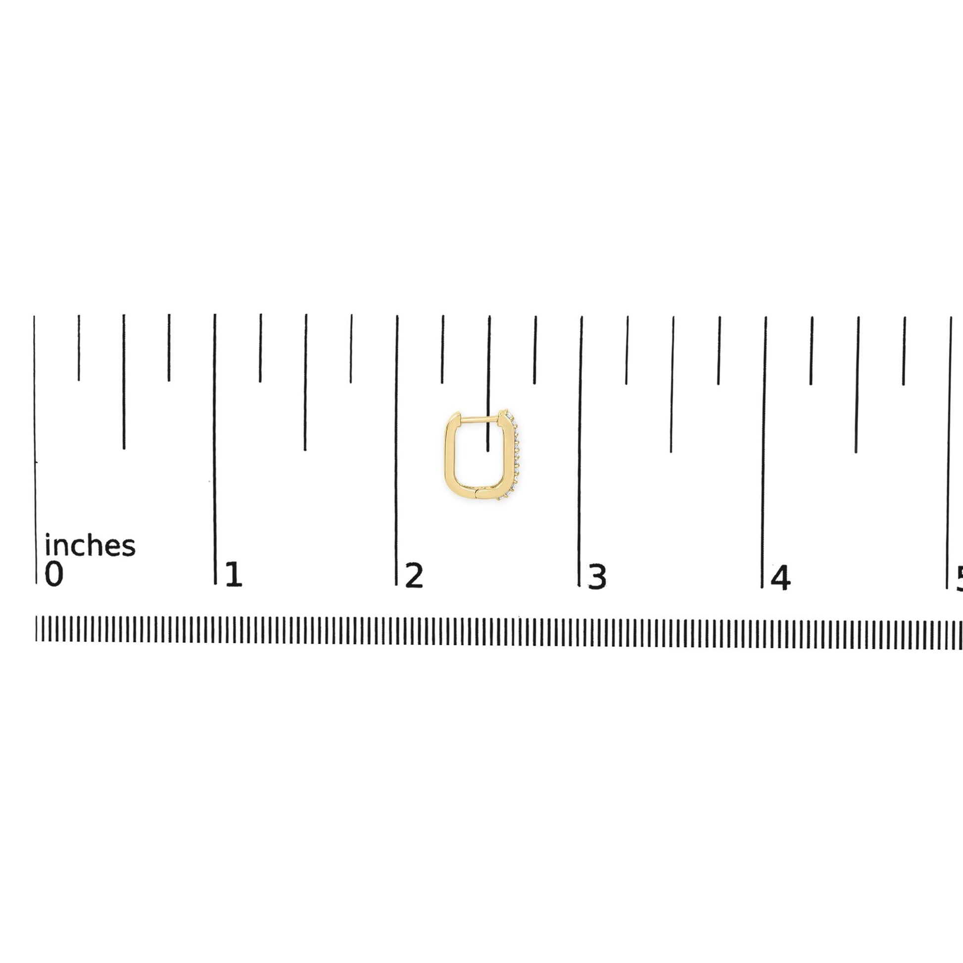 Close-up image of a single yellow metal rectangular hoop earring with white round gemstones set in a shared prong setting along one outer edge, shown on a ruler scale from a top-down angle.