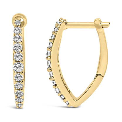 Pair of yellow metal hoop earrings with a pointed shield shape, each featuring a row of round white gemstones set along the outer edge in a shared prong setting, shown against a white background with one earring facing forward and the other at a side angle.