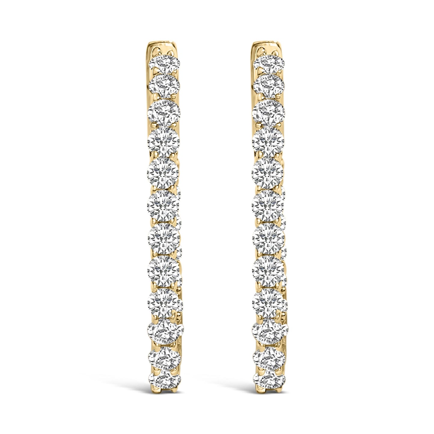 Front view of a pair of yellow metal hoop earrings, each adorned with a vertical line of round white gemstones in a shared prong setting.