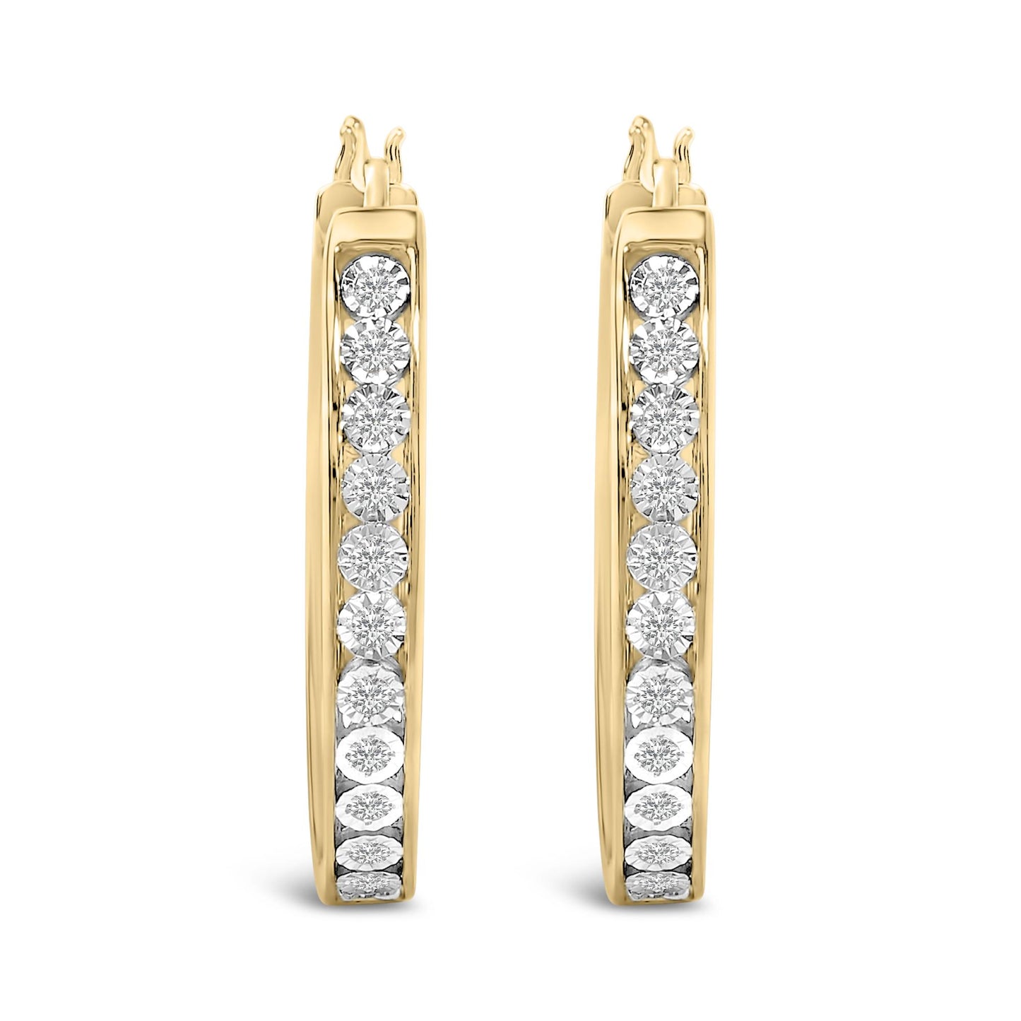 Front-facing close-up of a pair of curved earrings in yellow and white metal, each featuring a vertical row of round white gemstones in bezel settings.