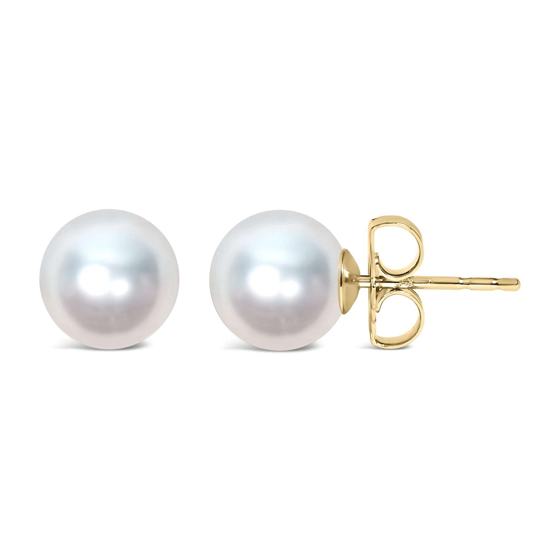 Pair of yellow metal stud earrings with round white gemstone pearls, shown from a front and side angle on a white background.