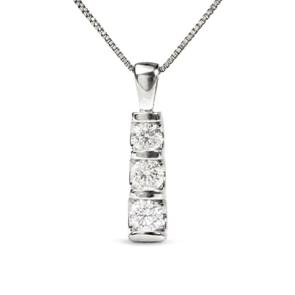 Close-up front view of a white metal necklace pendant featuring a vertical bar with round white gemstones in a channel setting.