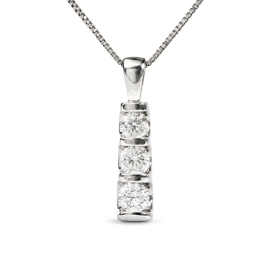 Close-up front view of a white metal necklace pendant featuring a vertical bar with round white gemstones in a channel setting.
