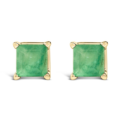 Pair of square-shaped yellow metal stud earrings with green princess-cut gemstones set in four prongs, shown from the front angle on a white background.
