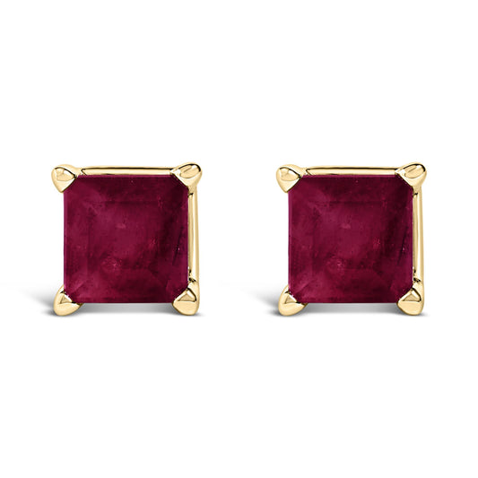 Pair of square-shaped yellow metal stud earrings with red square gemstones set in four-prong settings, front-facing angle.