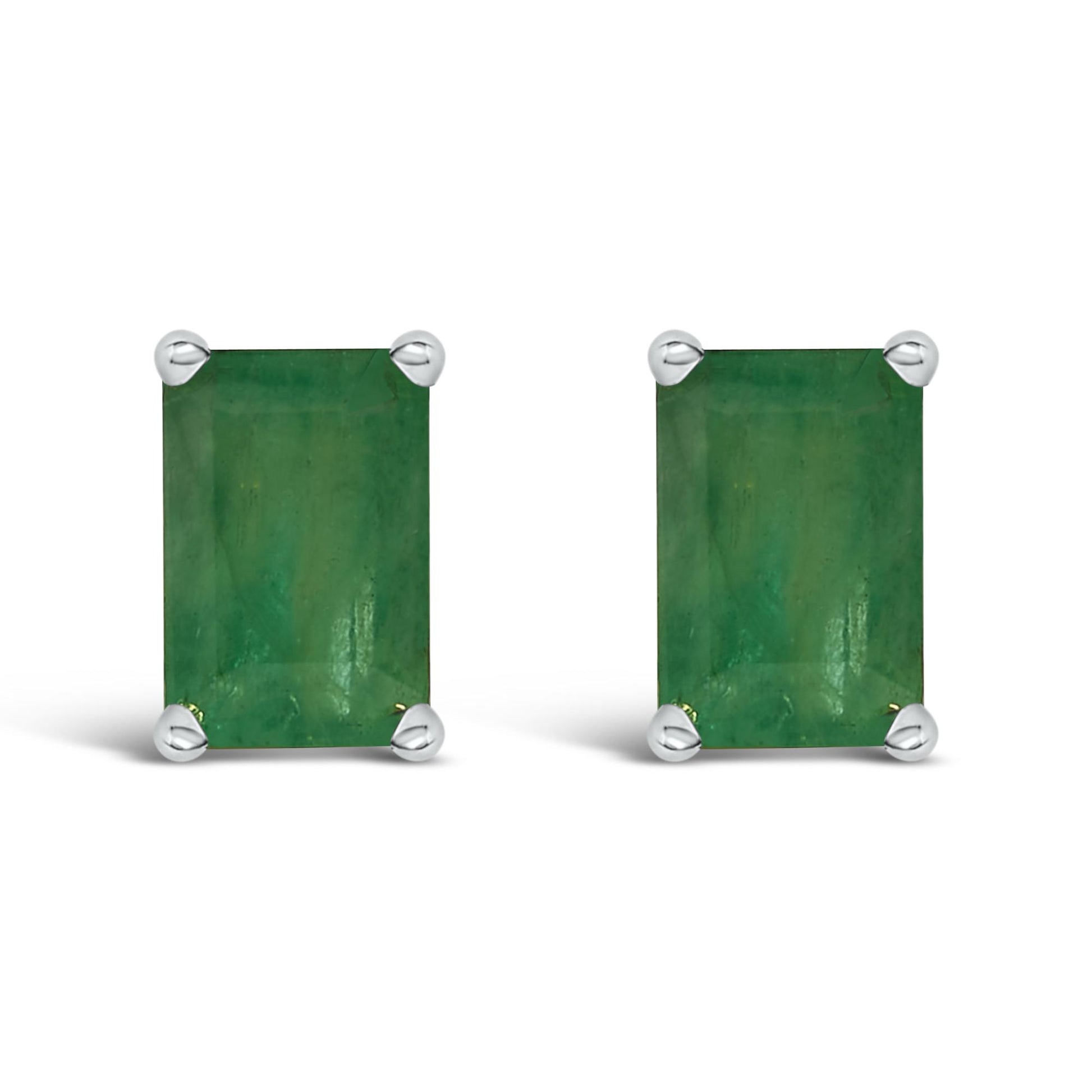 Front view of white metal earrings with rectangular green gemstones in a four-prong setting.