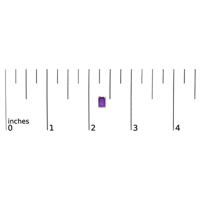 Yellow metal earrings with purple emerald-shaped gemstones in 4-prong settings, shown on a scale from a top-down angle.