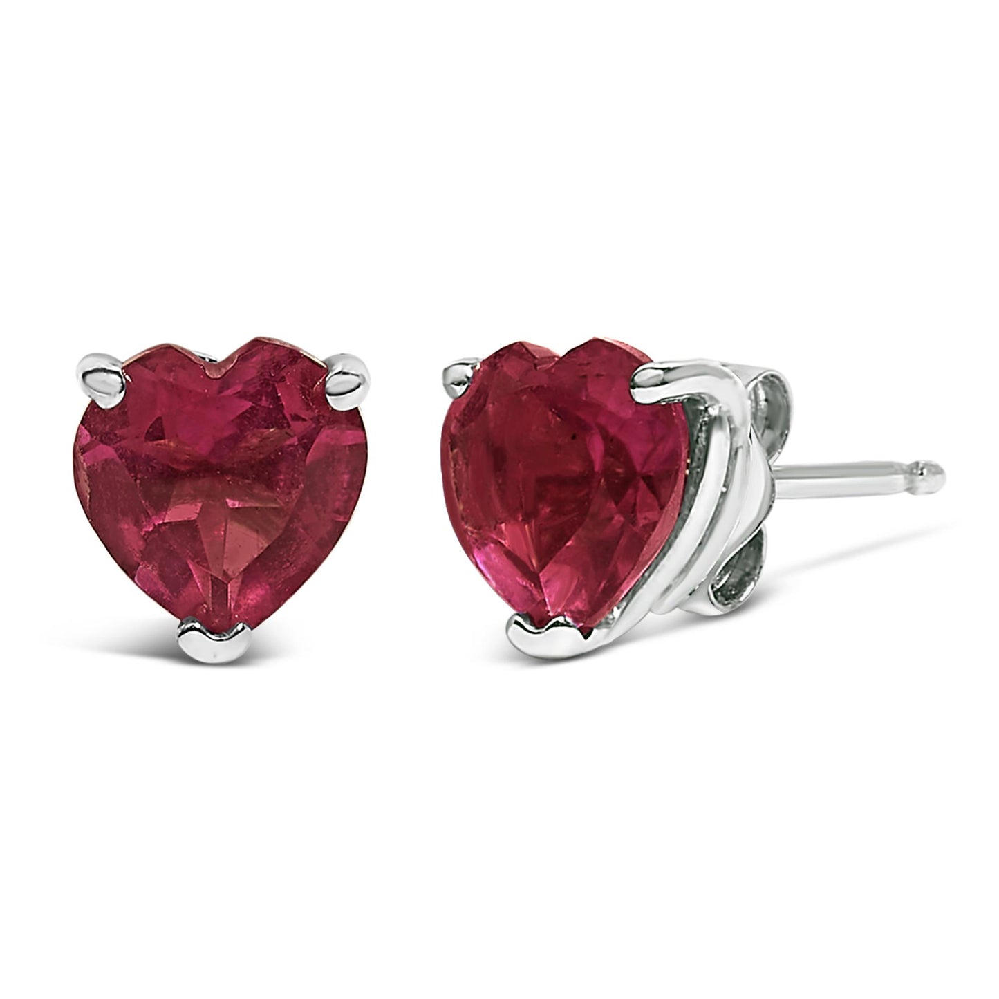 Close-up front and side angle of white metal stud earrings with heart-shaped red gemstones in three-prong settings.
