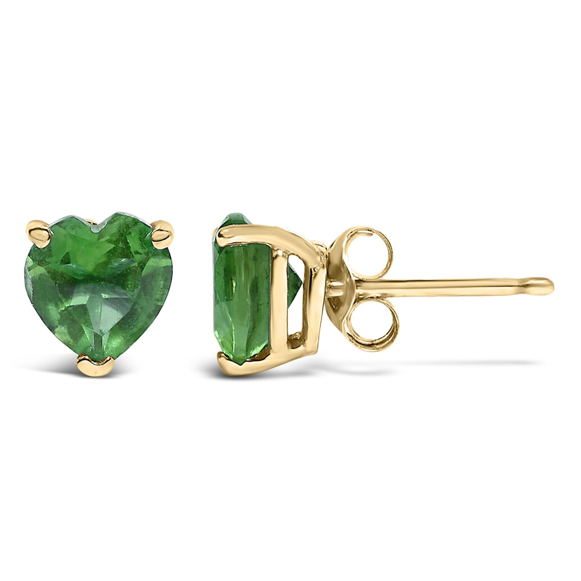 Pair of yellow metal stud earrings with heart-shaped green gemstones in three-prong settings shown from front and side angles.