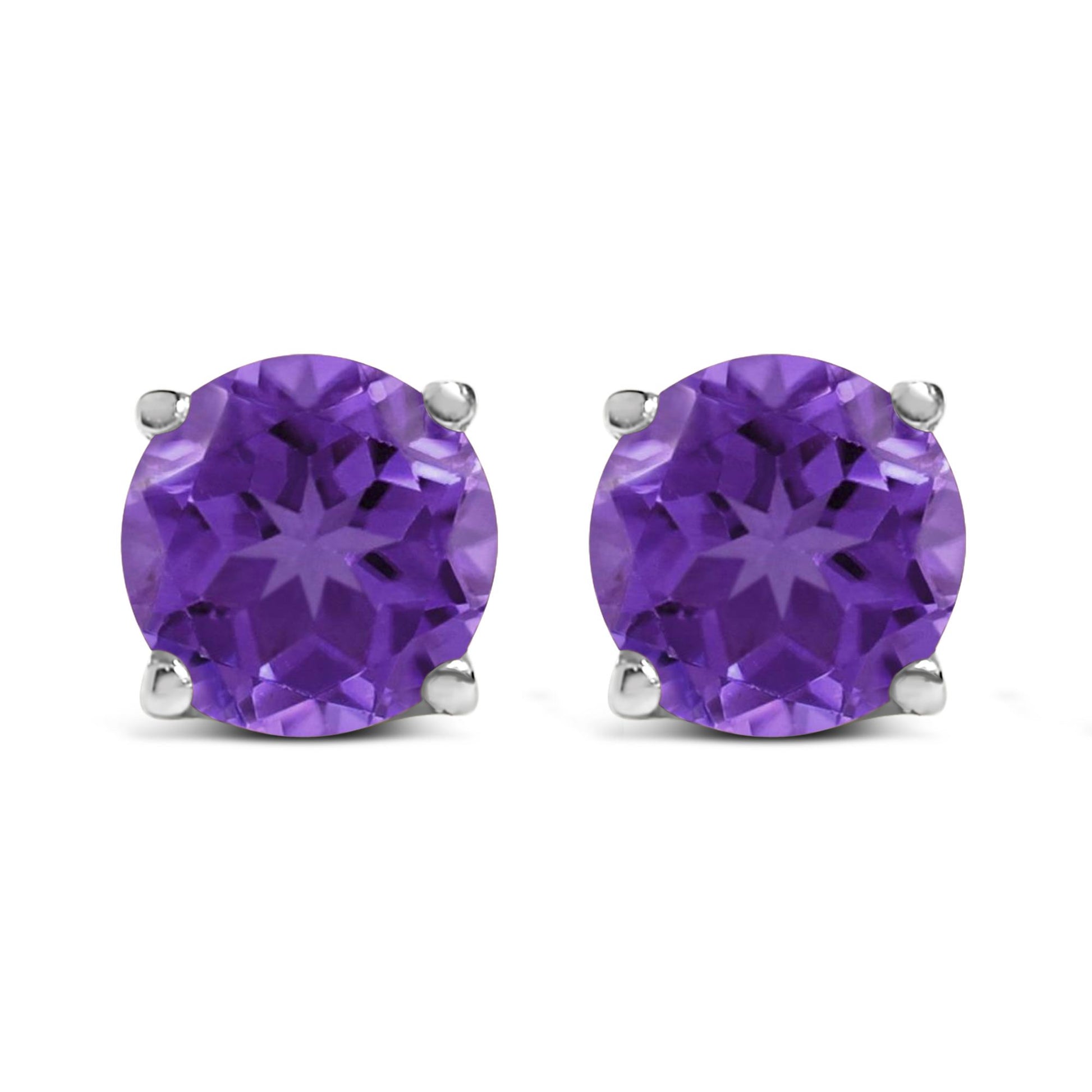Front view of round purple gemstone stud earrings set in white metal with four-prong settings.