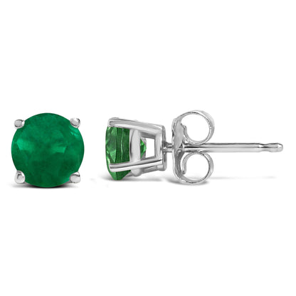 Pair of white metal stud earrings with round green gemstones in 4-prong settings, shown from front and side angles on a white background.