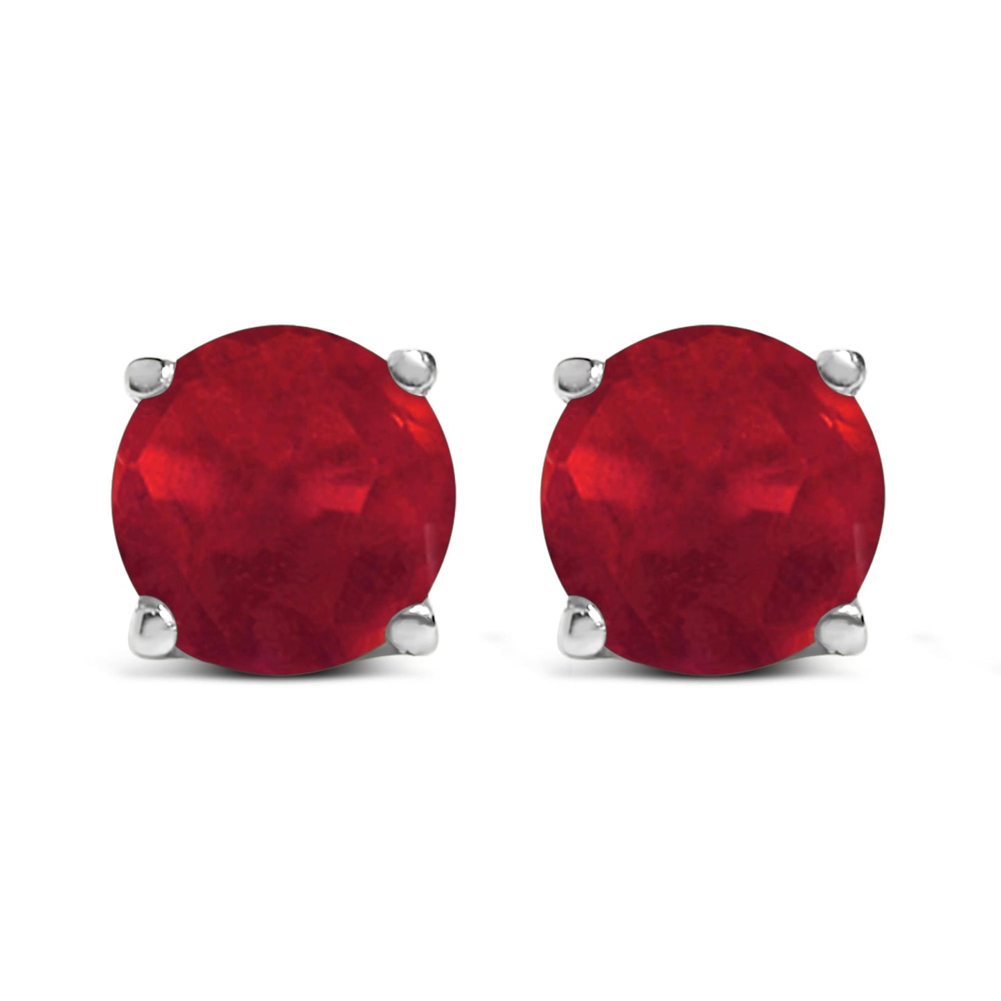 Front view of white metal stud earrings with round red gemstones in a four-prong setting.