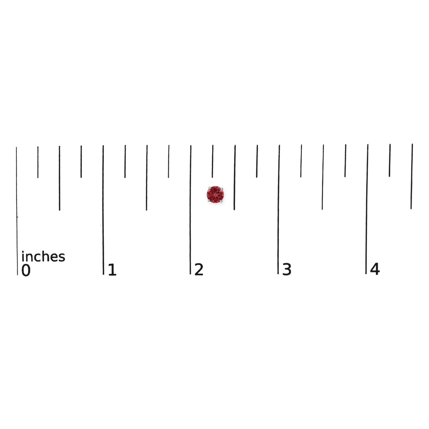 Close-up of a round red gemstone earring with four-prong setting placed on a ruler for scale.