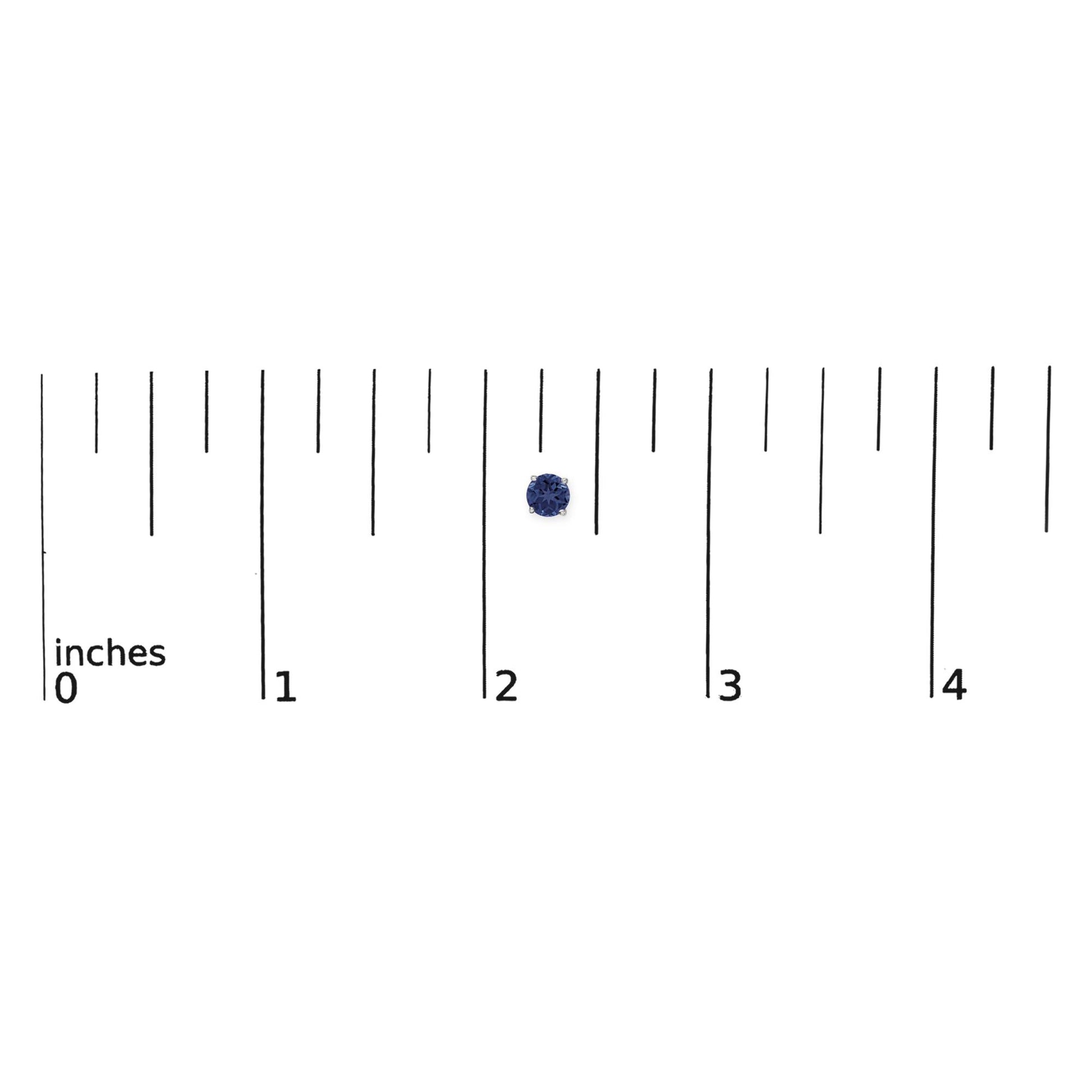 Close-up front view of a single round blue gemstone earring in a four-prong white metal setting, shown on a scale.