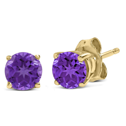 Close-up front and side view of yellow metal stud earrings featuring round purple gemstones in four-prong settings.