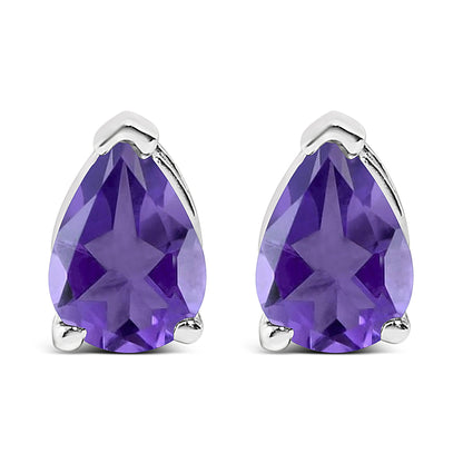 Pair of white metal earrings with pear-shaped purple gemstones set in three prongs, shown in a front-facing close-up shot.