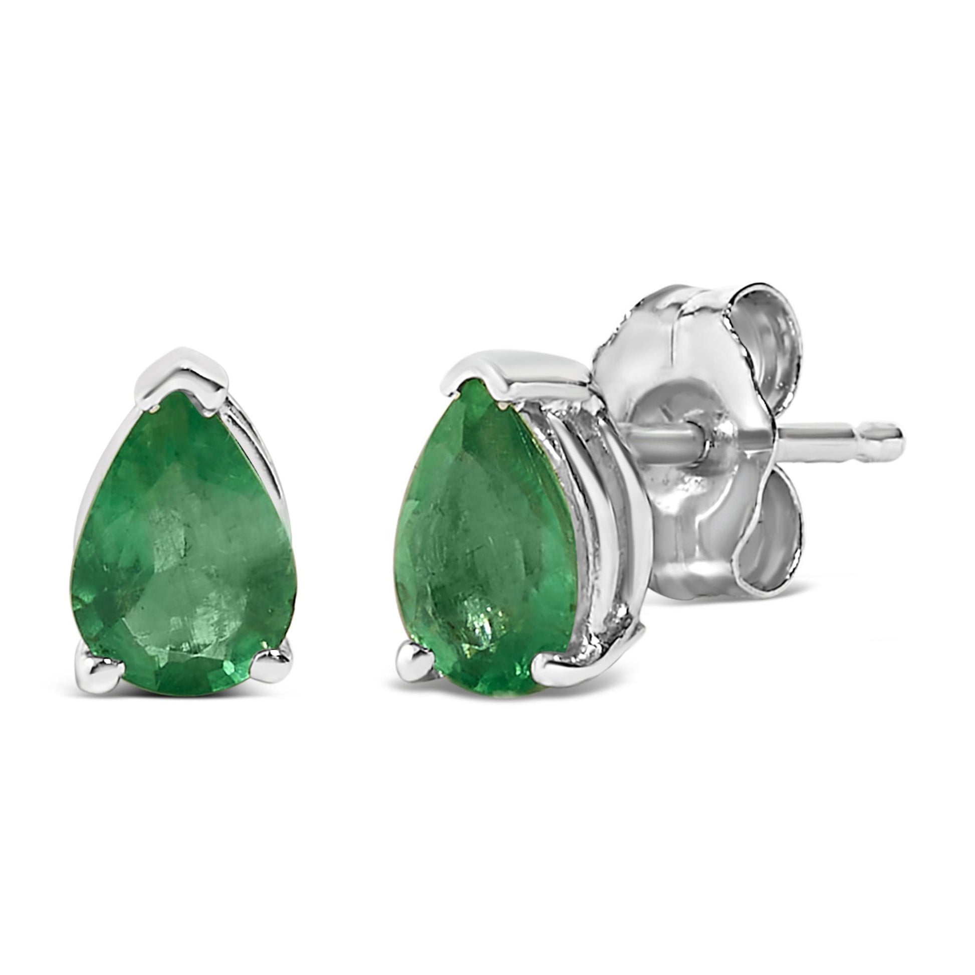 Pair of white metal stud earrings with pear-shaped green gemstones in a three-prong setting, shown against a white background from a side-front angle.