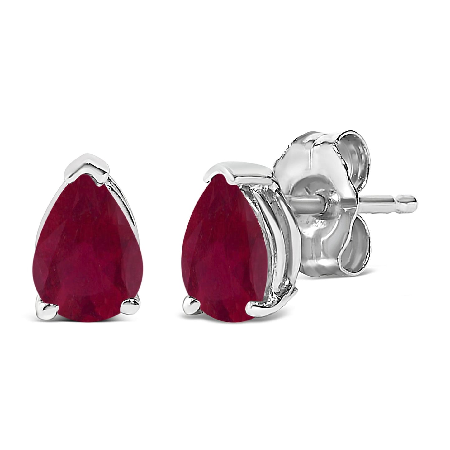 Pair of white metal stud earrings with pear-shaped red gemstones in a three-prong setting, shown from a close-up side and front angle.