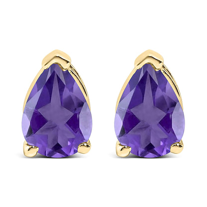 Pair of yellow metal stud earrings with pear-shaped purple gemstones, shown in a front-facing close-up.