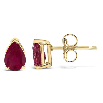 Pair of yellow metal stud earrings with pear-shaped red gemstones in a 3-prong setting, shown from front and side angles on a white background.