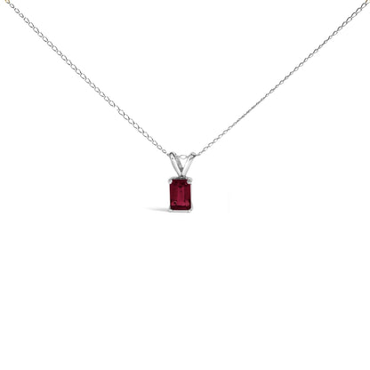 White metal necklace with a rectangular red gemstone pendant in a four-prong setting, shown from the front on a white background.
