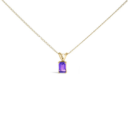 Yellow metal necklace with a rectangular purple gemstone pendant in a four-prong setting, shown from the front on a white background.