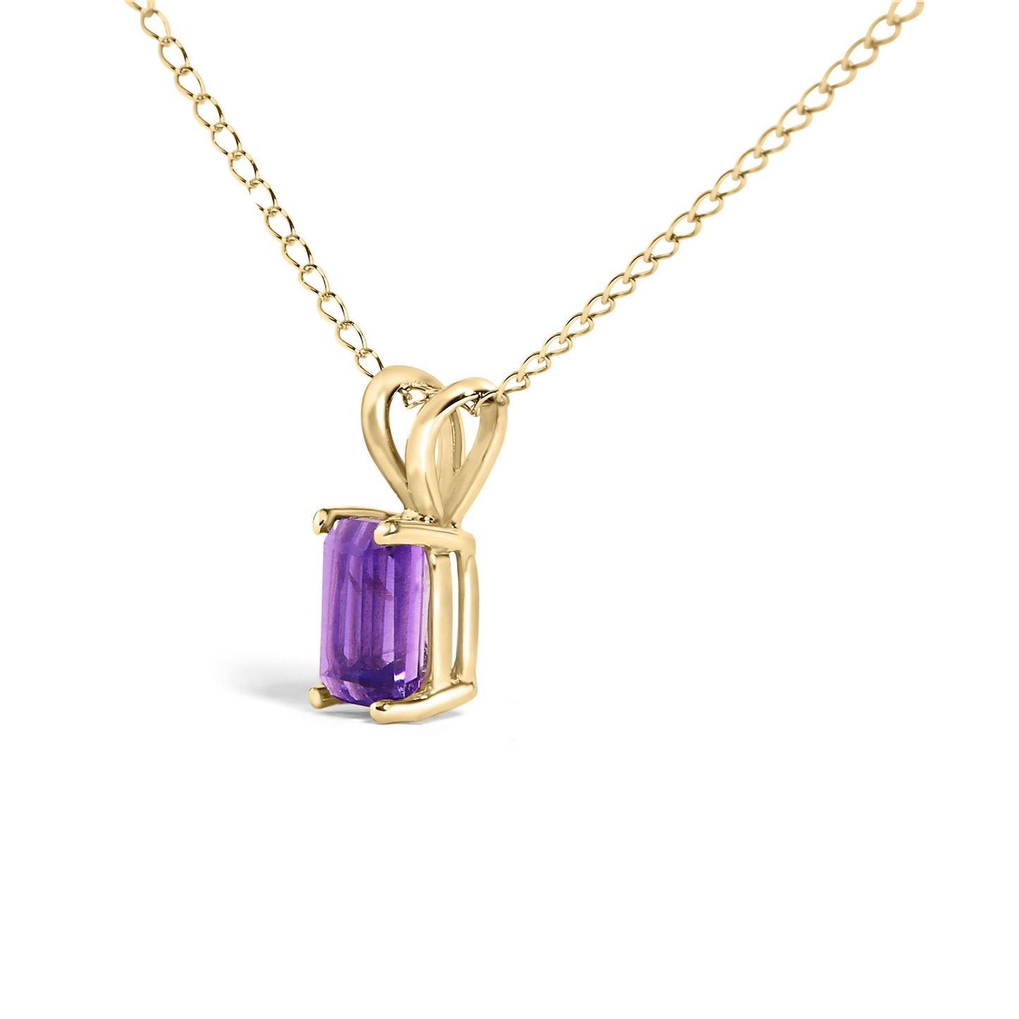 Close-up front angle of a yellow metal necklace with a purple emerald-shaped gemstone pendant set in a four-prong setting.
