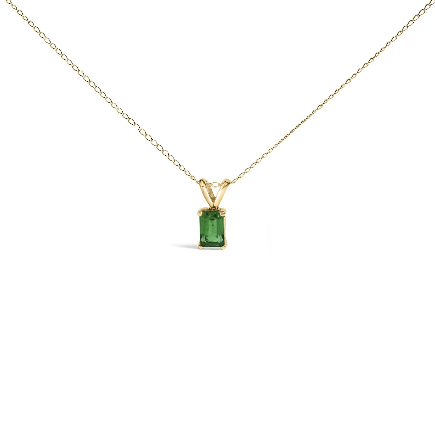 Front view of a yellow necklace with a rectangular green gemstone pendant held by four prongs.