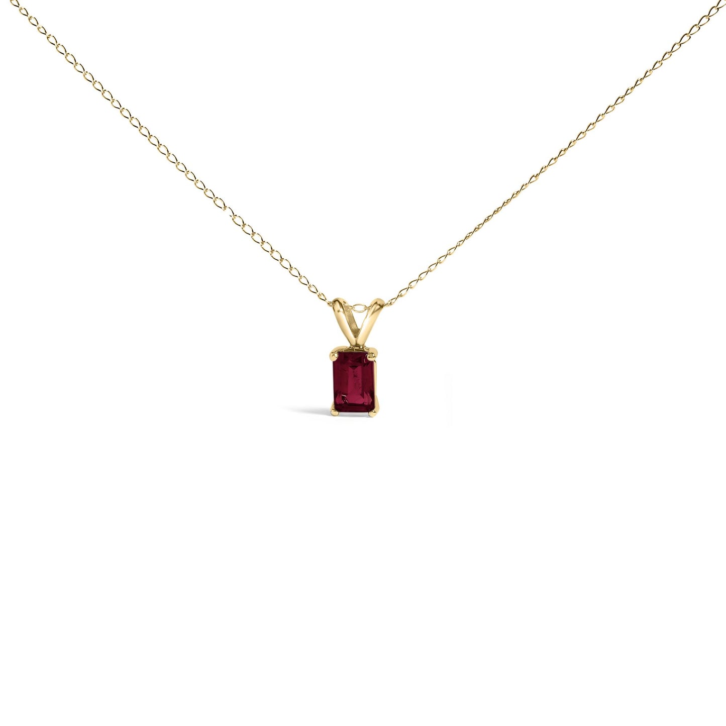 Yellow necklace with an emerald-shaped red gemstone pendant in a four-prong setting, shown from the front on a white background.